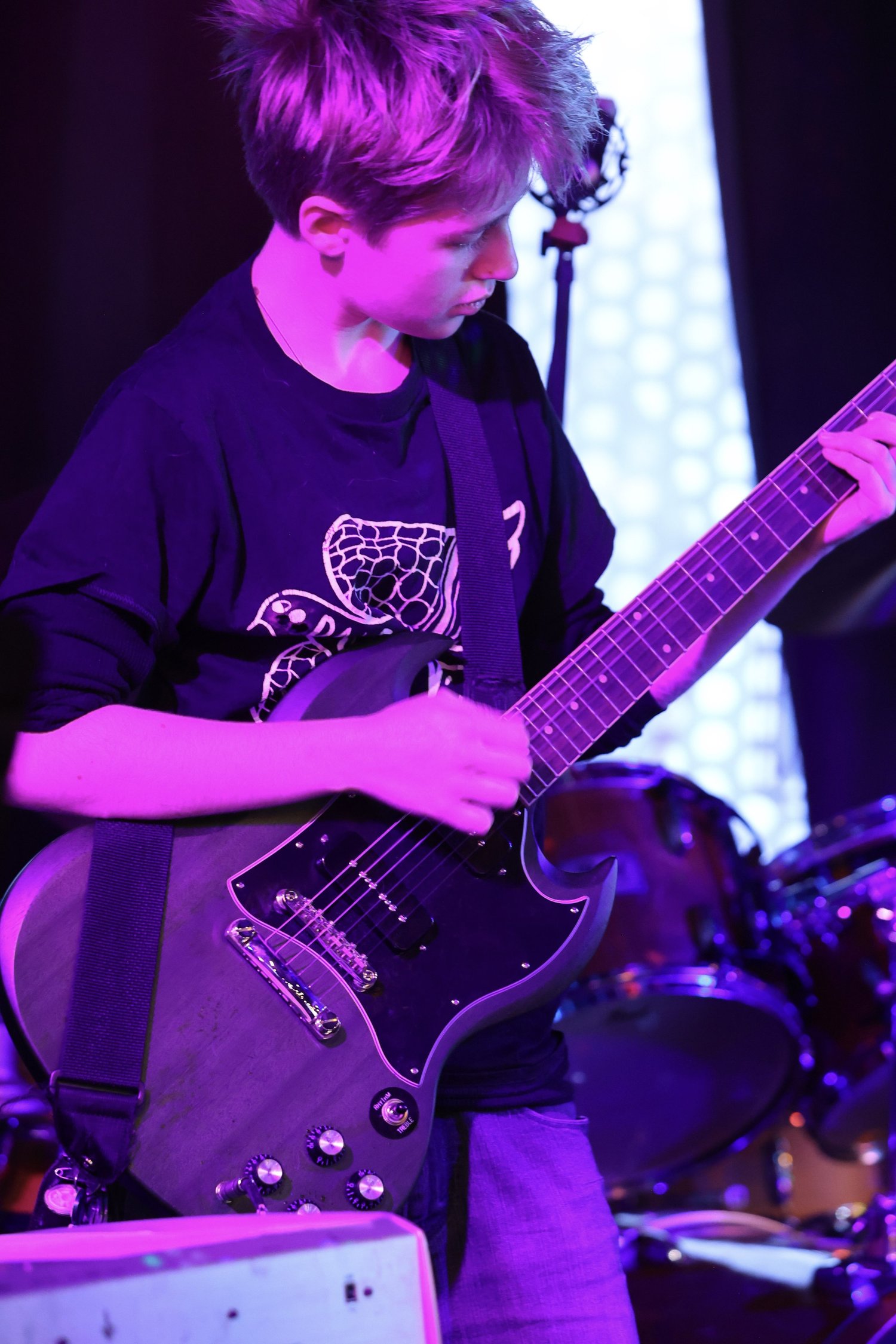 Rock Lab student playing guitar